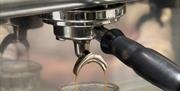 An espresso shot being poured.