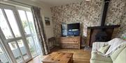 living room with fireplace and tv