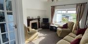 Spacious double bedroom to the back of the cottage with views of the countryside.