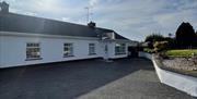 Spacious double bedroom to the back of the cottage with views of the countryside.