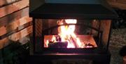 The outside fire provides heat in the evening's creating a cosy atmosphere.