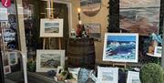 Front window of Midtown Makers shop