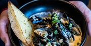 Bowl of local shell fish and bread