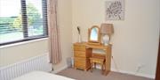 Image of dresser in bedroom