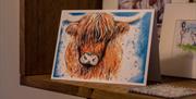 artwork of a cow on display