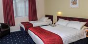 triple room with 1 double bed and 1 single bed