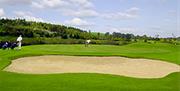 Image is of golf course and sand pit