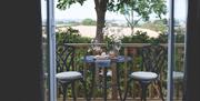 Cosy outside sitting area overlooking pretty scenery