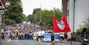 A massive turnout for the 2022 parade which made it's way from the University of Ulster's Magee Campus into the city centre