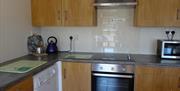 kitchen interior at Bushmills Porthole Cottage