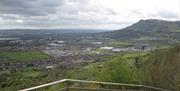 A view overlooking a city with a mountain.