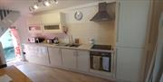 Kitchen, Fully fitted, Dishwasher, Washing Machine, Oven, Ceramic hob and extractor, Fridge-freezer, Microwave