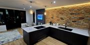Image of the open plan kitchen and living area