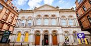 An image showing the exterior of an old bank converted into a creative space.