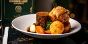 A roast with a Yorkshire pudding.