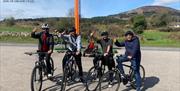 Group of young men starting from our hub in Drumintee with Slieve Gullion summit in the background.