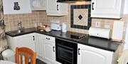 Image shows kitchen area