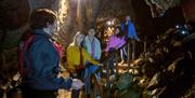 Group learns about the Marble Arch Caves during a guided tour