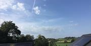 Image shows view of the countryside from high up on property