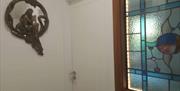 stain glass window and antique mirror