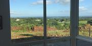 View of fields from inside the house