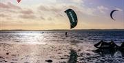 Kite surfers on the water