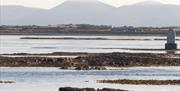 a photo showing the lough with the mountains in the background