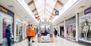 View of inside and the help desk in Buttercrane Shopping Centre.