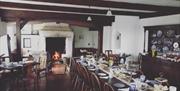 dining hall with several tables and chairs