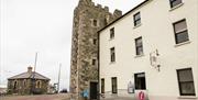A photo of the 17th century old Tower House which houses Bangor Visitor Information Centre and offices of Ards and North Down Borough Council