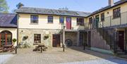 Blessingbourne Courtyard apartments with picnic tables outside