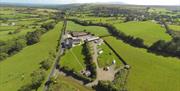 aerial view of Shepherd's Rest with surrounding green fields and mountains