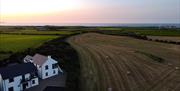 aerial view of exterior of Atlantic Lookout Holiday accommodation at sunset