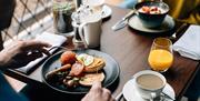 dining table with breakfast served