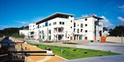 Image shows front of the Civic Centre which houses the Island Arts Centre