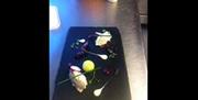 Food served on a slate in the restaurant.