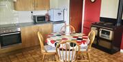 interior of kitchen area at Bushmills Porthole Cottage