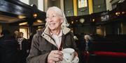 A lady enjoying an event at The Portico of Ards