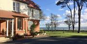 Exterior building with view across the sea