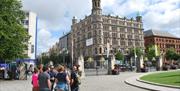 A group of DC Tours guests at Belfast City Hall