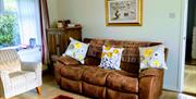 living area at Bushmills Porthole Cottage