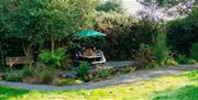 Family looking though picnic basket at Ballyburren Outdoor Escapes