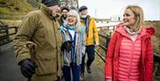 Mark Rodgers leads group towards the carrick-a-rede rope bridge