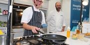 chefs perform a live demonstration