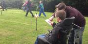 Disability inclusion in an orienteering course.