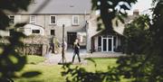 Two people playing basketball outside  Hillside Holiday Home and Lodge, Rostrevor.