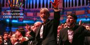 A snapshot from a performance with the Guildhall's organ visible in the background.