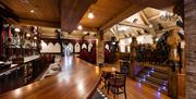 Upstairs lounge interior showing the bar area and upper seating area at Charlie's Bar Enniskillen