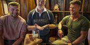 A tasting of famous Bushmills Whiskey is included as part of the Coast and Country foodie tour experience