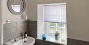 Refurbished shower room, large walk in shower, Italian ceramic tiling, basin, medicine cabinet, towel radiator